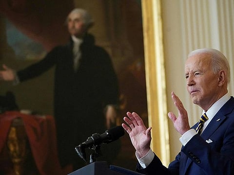 US President Joe Biden speaks during a press conference on the eve of his first year in office, from the East Room of the White House in Washington, DC on January 19, 2022. - President Joe Biden holds a rare press conference Wednesday to kick off his second year in office, hoping to reset the agenda ahead of what could be brutal election reversals for Democrats.