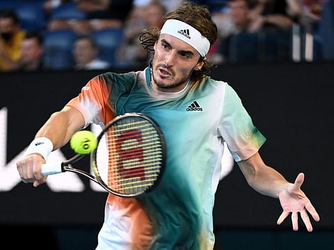 Greece's Stefanos Tsitsipas in action during his third round match against France's Benoit Paire.