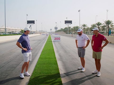 Rory MciIlroy, Tyrrell Hatton and Collin Morikawa take part in the 'one-yard fairway' Hero Challenge
