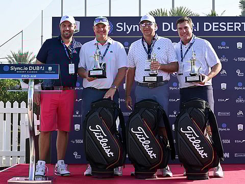 Winners Slync.io 2 team at the prize ceremony of the Slync.io Dubai Desert Classic Pro-Am on Wednesday.