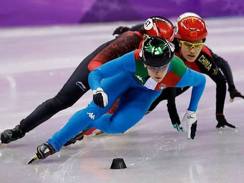 Arianna Fontana of Italy leads the field during their women's 1,000-metre short track speedskating. The Italian faces a tough competition from Dutch sensation Suzanne Schulting.