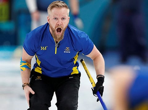 Skip Niklas Edin of Sweden shouts to his teammates. The Swede will be aiming to collect the elusive gold in Beijing.