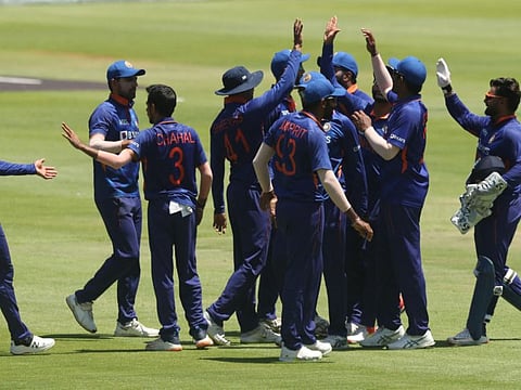 India's Yuzvendra Chahal celebrates with teammates after taking a wicket in the final one-dayer against South Africa. The leg-spinner needs to get back his rhythm to give India the wickets.