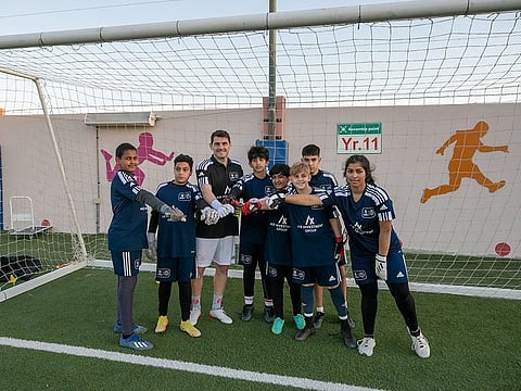 Iker Casillas, Spain and Real Madrid's legendary goalkeeper, with the trainees during his clinic in Dubai.