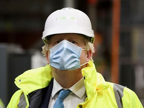 Boris Johnson visits the Orthios Eco Park, Holyhead, Anglesey, Wales, on January 27, 2022.