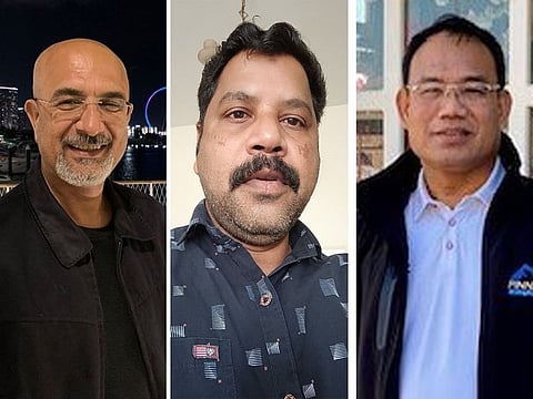 From left: Mahzooz draw winners Shokrollah, Ashraf and Willie.