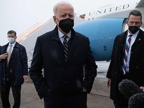 US President Joe Biden speaks to the press about the situation in Ukraine, after arriving on Air Force One at Joint Base Andrews in Maryland, January 28, 2022.