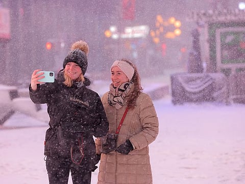 Time for a selfie: The snow carpeted Times Square during a nor'easter storm in Manhattan, New York City, on January 29, 2022.