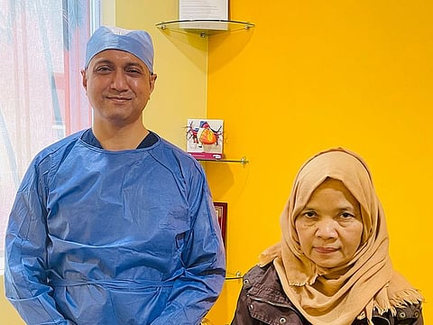 Nanik Harjo, 50, right, with Dr Sanjay Rajdev at NMC Specialty Hospital, Abu Dhabi.