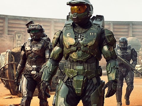 Pablo Schreiber as Master Chief, Kate Kennedy as Kai and Bentley Kalu as Vannak in Halo Season 1, streaming on Paramount+ 2022.