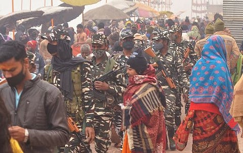 Sashastra Seema Bal (SSB) personnel along with Uttar Pradesh (UP) Police conduct a flag march at Varanasi Ghat ahead of UP Assembly elections, on February 1, 2022.