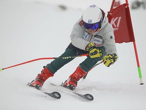 Kiana Kryeziu speeds down the course during training at the Arxhena Ski center in Dragas, Kosovo. The 17-year-old carrying nation's hopes after becoming the first female athlete from Kosovo at the Winter Olympics.