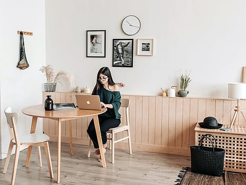 A round table with some plants will definitely help create a sense of 'green care' around your desk space