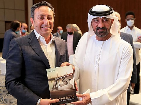 Sheikh Ahmed bin Saeed Al Maktoum (R) with author Raed Barqawi (L) during the launch of ‘Dare to Dream: How Mohammed bin Rashid Made His Dream Come True’ at Emirates Airline Festival of Literature on Sunday in Dubai