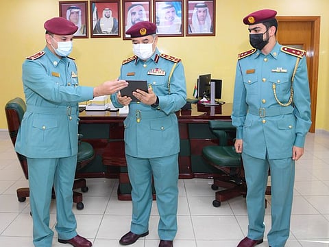 Brigadier General Abdullah Ali Munkhis, Director General of Police Operations at the General Command of Ras Al Khaimah Police, with other top police officials.