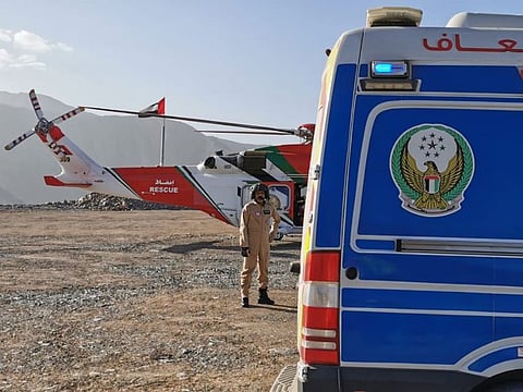 National Search and Rescue Centre helicopter and National Ambulance on Yanis Mountain in Ras Al Khaimah on Sunday