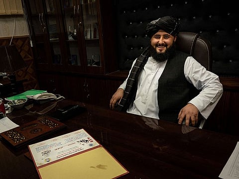 This picture taken on January 18, 2022 shows Maymana mayor Damullah Mohibullah Mowaffaq posing for a picture at his office in Maymana, capital of Afghanistan's northwestern Faryab province.