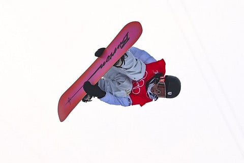 Japan's Ayumu Hirano competes in the snowboard men's halfpipe qualification run during the Beijing 2022 Winter Olympic Games at the Genting Snow Park H & S Stadium in Zhangjiakou.