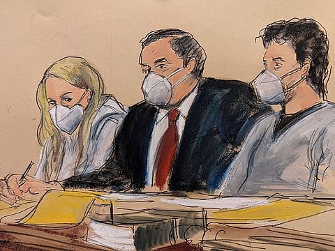 In this courtroom sketch, attorney Sam Enzer, center, sits between Heather Morgan, left, and her husband, Ilya 'Dutch' Lichtenstein, in federal court, Tuesday, Feb. 8, 2022, in New York.
