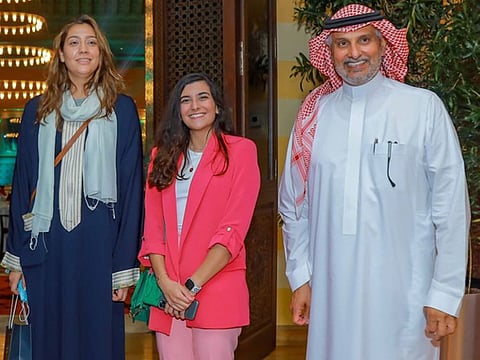 Abdullah Bakhashab, rally director with drivers Dania Akeel and Samar Rahbin.