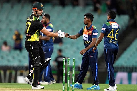Australia's batsman Marcus Stoinis (left) after the second T20 international cricket series match against Sri Lanka at the Sydney Cricket Ground (SCG) in Sydney.
