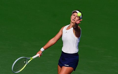 Barbora Krejčíkova of Czech Republic ready to serve against Caroline Garcia of France on the opening day of the WTA Tour Dubai Tennis Championships at Aviation Stadium on Monday.