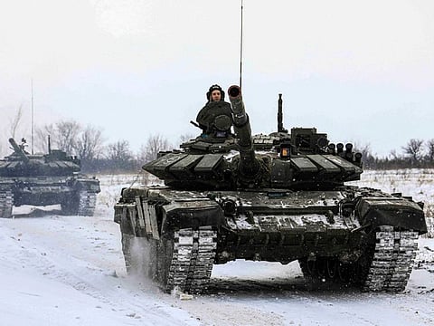 Russian tanks roll on the field during military drills in Leningrad region, Russia. Russian defence ministry’s spokesman said that some forces deployed near Ukraine had completed their exercises and were packing up to leave.