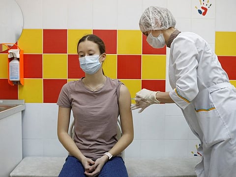 A teenager receives a dose of Sputnik M (Gam-COVID-Vac-M) vaccine at a clinic in Nizhny Novgorod, Russia, on February 10, 2022.