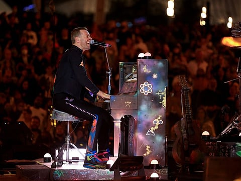Chris Martin of the band Coldplay performs at Expo 2020 in Dubai, United Arab Emirates, February 15, 2022.