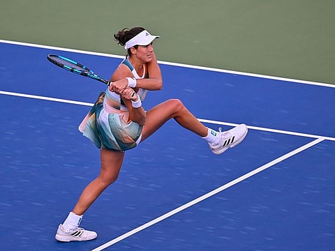 Garbine Muguruza crashed out of the Dubai Duty Free Tennis Championships
