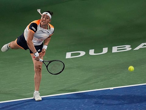 Ons Jabeur in action against Simona Halep at the Dubai Duty Free Tennis Championships