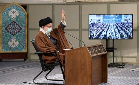 Iranian Supreme Leader Ayatollah Ali Khamenei gestures during the meeting via video conference with people from East Azarbaijan in Tehran, on February 17, 2022.