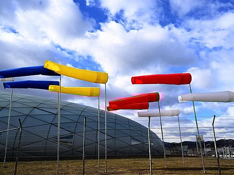 Wind vanes are seen at a hangar of Salzburg Airport, Austria, on February 17, 2022, as storms with gale-force winds hit the country as in other European countries.