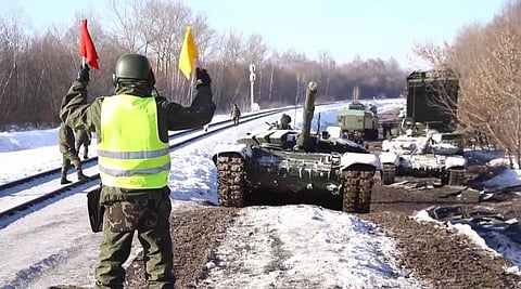This handout video grab released by the Russian Defence Ministry on February 17, 2022, shows Russian tanks leaving for Russia after joint exercises of the armed forces of Russia and Belarus, as part of an inspection of the Union State's Response Force, at a firing range near Brest.