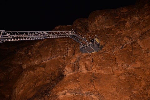 Saudi civil defence teams carry out an operation to rescue the child in H'ail.