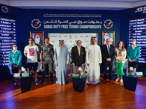 (Left to Right) ATP players Lorenzo Musetti and Malek Jaziri with Colm Mcloughlin, Executive Vice Chairman & CEO, Dubai Duty Free, Salah Tahlak, Tournament Director, Naser Yousef Al Marzooqi, Secretary General, UAE Tennis Federation, Thomas Karlberg, ATP Supervisor, and Sinead El Sibai, Dubai Duty Free Senior Vice President of Marketing, during the ATP Draw presentation at Dubai Duty Free Tennis Stadium, Dubai.