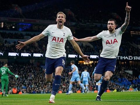 Tottenham's Harry Kane (left) celebrates with Pierre-Emile Hojbjerg after scoring his side's second goal during the English Premier League match against Manchester City at the Etihad stadium in Manchester, England.