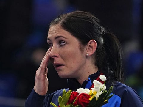 Britain's Eve Muirhead, from the gold medalist team, cries during a medal ceremony for the women's curling at the Beijing Winter Olympics in Beijing.