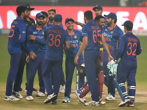 Indian players celebrate after their win in the third Twenty20 International against West Indies in Kolkata on Sunday, Feb. 20, 2022. (AP Photo/Bikas Das)