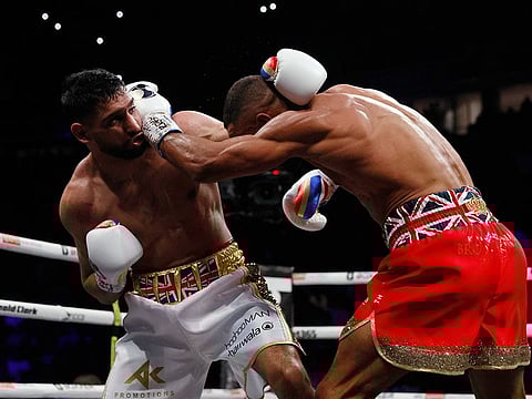 British boxer Amir Khan (left) suggested that he is considering retirement from the sport after suffering a comprehensive defeat with a sixth-round technical knockout at the hands of Kell Brook on Saturday.