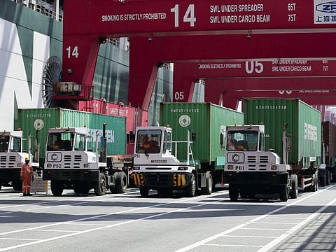 Container trucks with waste, which were imported to Sri Lanka from Britain some time back and seized by Central Environmental Authority and the Sri Lanka Customs, wait in a line as authorities re-export them back to Britain, at the Port of Colombo, in Colombo, Sri Lanka February 21, 2022.