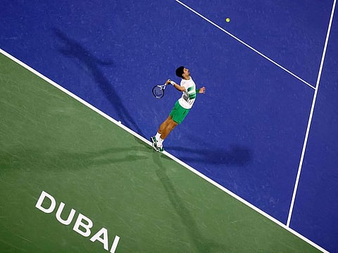 Novak Djokovic in action against Russian Karen Khachanov at the Dubai Duty Free Tennis Championships