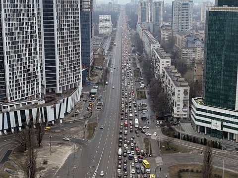 Traffic jam as people leave the city of Kyiv, Ukraine, Thursday, Feb. 24, 2022.