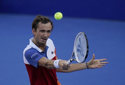 Daniil Medvedev of Russia returns a ball during a match against to Yoshihito Nishioka of Japan in the quarterfinal of the Mexican Open tennis tournament in Acapulco, Mexico.