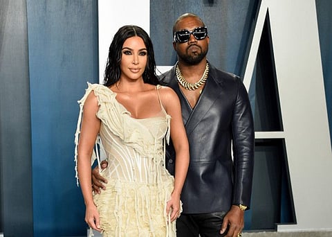 Kim Kardashian and Kanye West arrive at the Vanity Fair Oscar Party in Beverly Hills, California on February 9, 2020.