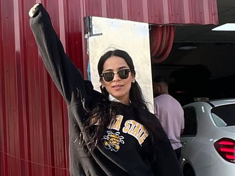 Tunisian expatriate and physical exercise instructor Manai Oumaima.