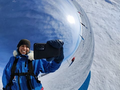 Preet Chandi takes a selfie on the Ceremonial South Pole after reaching the station after 40 days.
