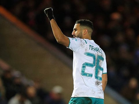 Manchester City's Riyad Mahrez celebrates scoring their first goal.