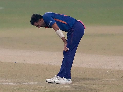 Indian pacer Deepak Chahar reacts after bowling a delivery during the third Twenty20 International against West Indies in Kolkata.