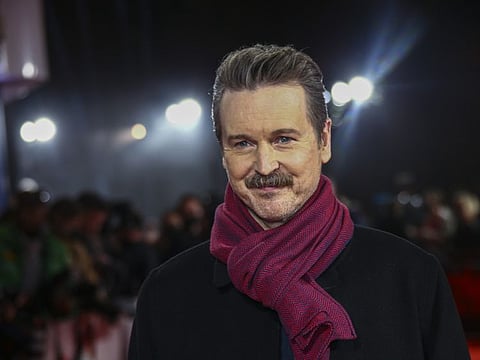 Matt Reeves poses for photographers upon arrival for the screening of the film 'The Batman' in London on February 23, 2022.